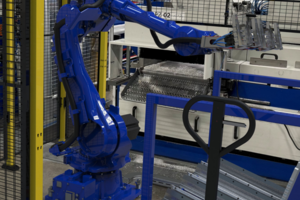 Robotafpaksysteem toegevoegd aan een zaagmachine Robotafpaksysteem toegevoegd aan een zaagmachine